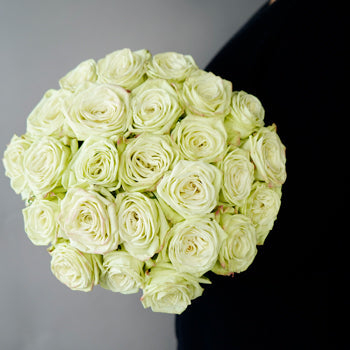 Green garden roses sold in bulk for customers to make a gift arrangement