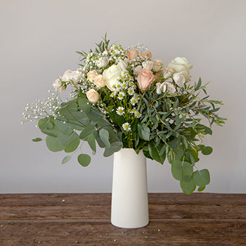 Perfectly Peach Rustic Flower Centerpieces in a vase