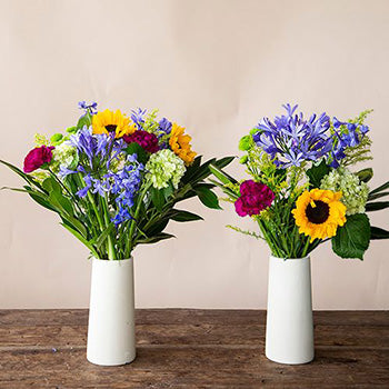 Bridal Centerpieces Purple Flowers and Sunflowers