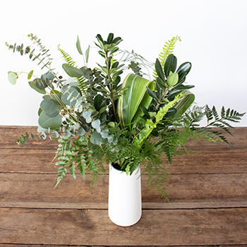 Tommy greenery mix bouquet in a vase