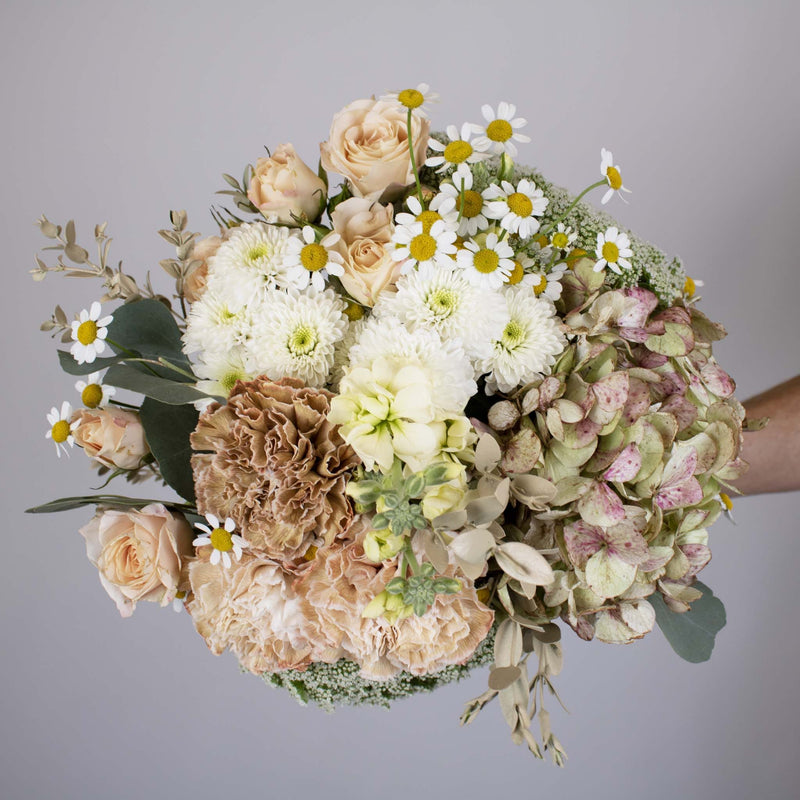 Soft Blush Flower Centerpiece in Hand