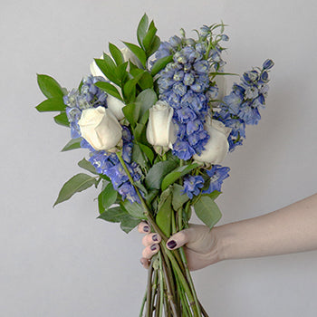 Dozen Cream Rose Table Arrangements