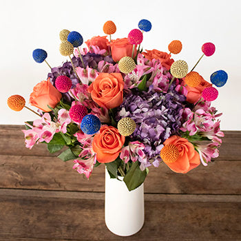 Silly Jester Orange and Pink Flower Bouquet