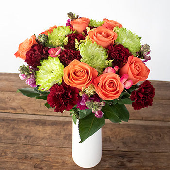 Spa Day Orange and Red Flower Arrangement