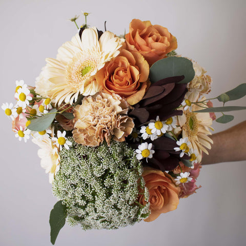 Earthy Boho Flower Centerpiece in Hand