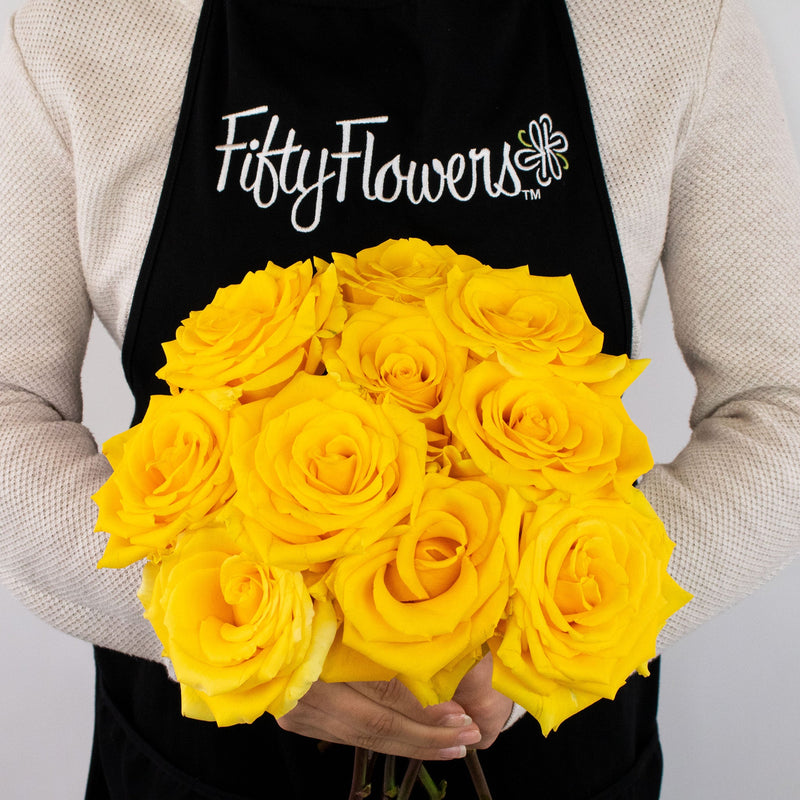Gold Strike Yellow Rose Flower Bunch in Hand
