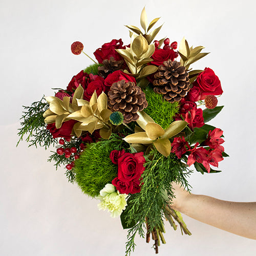 Jingle Bells Red Green Flower in Hand