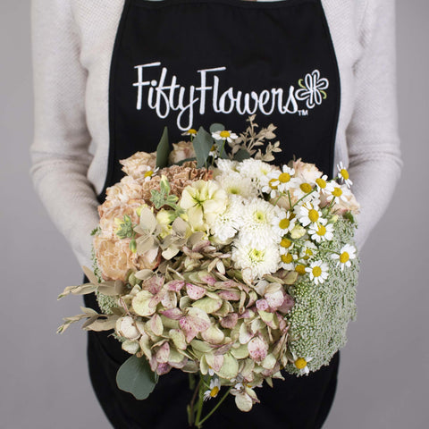 Soft Blush Flower Centerpiece in Hand
