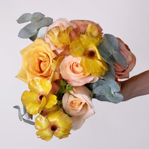 Peach Flower Centerpiece in Hand