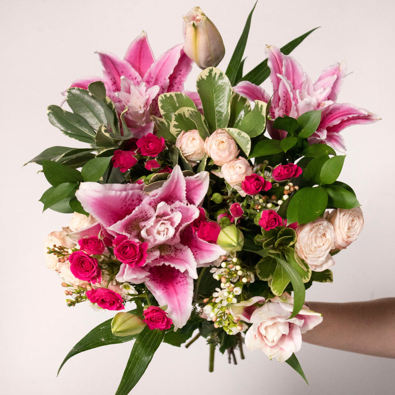 Lily Pink  Wholesale Flower Bunch in a hand