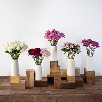 purple diy wedding flowers with roses and cremons