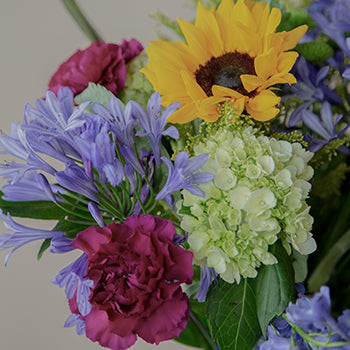 Bridal Centerpieces Purple Flowers and Sunflowers