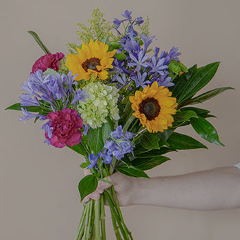 Bridal Centerpieces Purple Flowers and Sunflowers