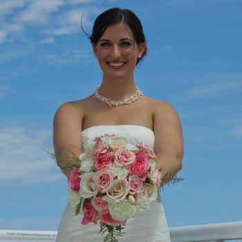 Bright Pink and White Wholesale Rose Carnation Bunch in a hand