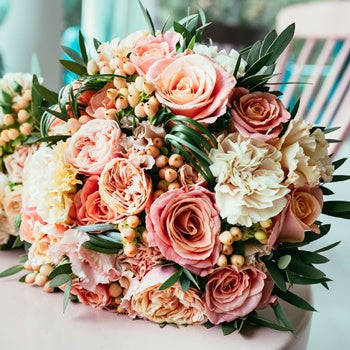 Coral and White Carnations and Roses up close