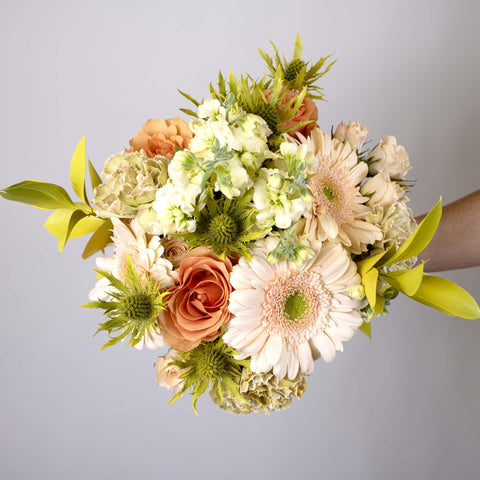 Sepia Toned Flower Centerpiece in Hand