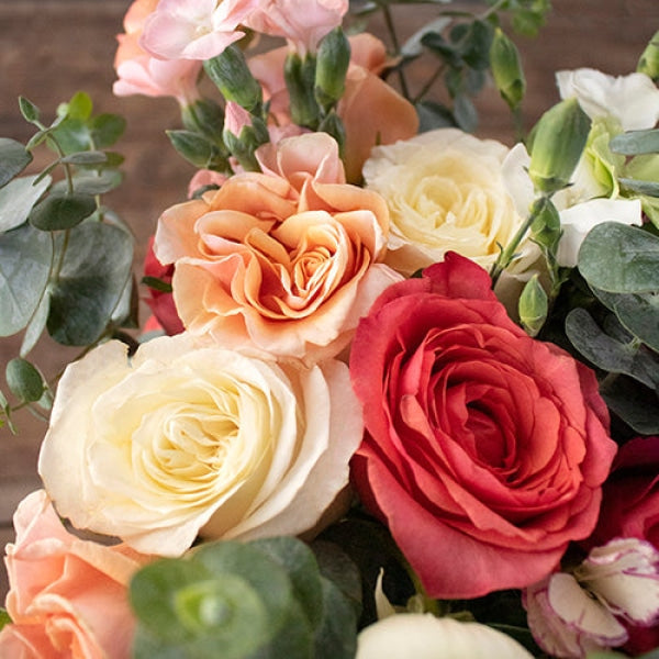 Simply Divine Peach Red Flower Bouquet Up Close