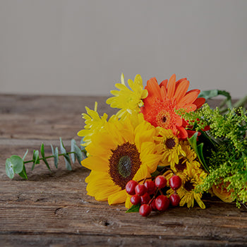 Bridal Centerpieces Sunflowers and Orange Flowers