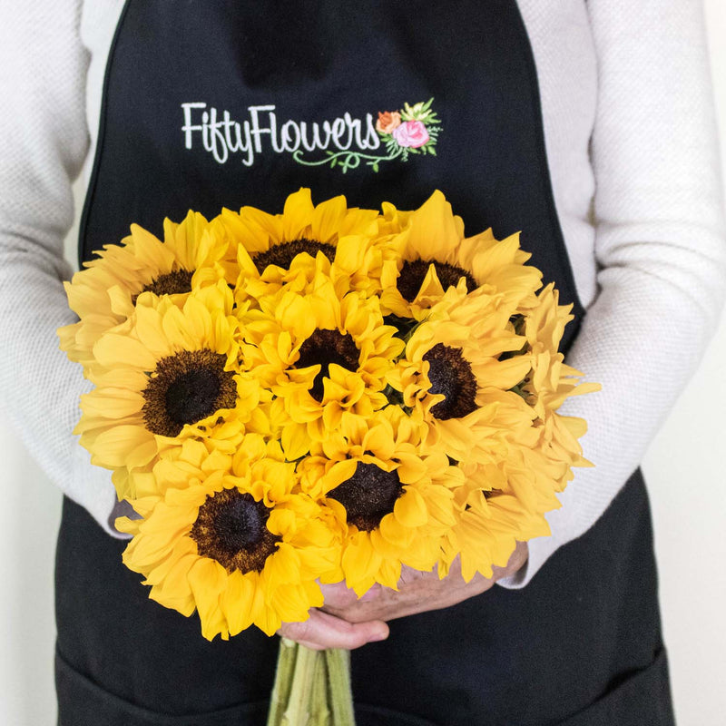 Yellow Sunflower Wholesale Flower Bunch In a Hand