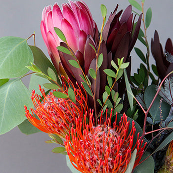 Sunset Lagoon DIY wedding flowers in vases