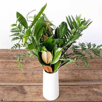 tropical greenery mix bouquet in a vase
