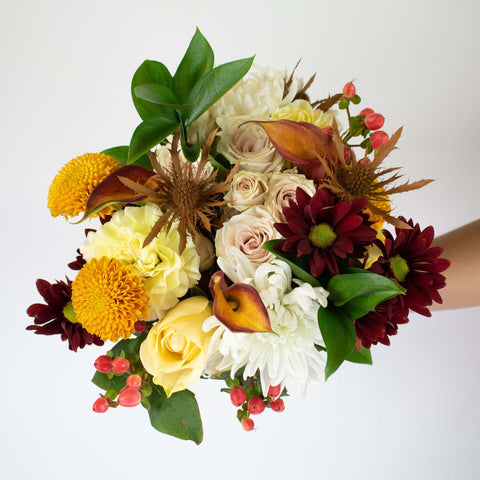 Yellow Burgundy Flower Centerpiece Hand-Held