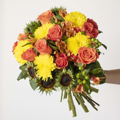Yellow and Orange Flower Bouquet in Hand